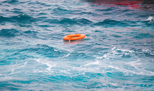 High angle view of toy floating on sea