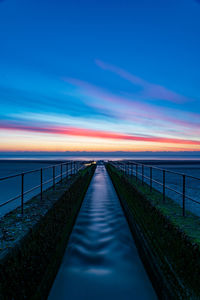 Scenic view of sea against sky during sunrise