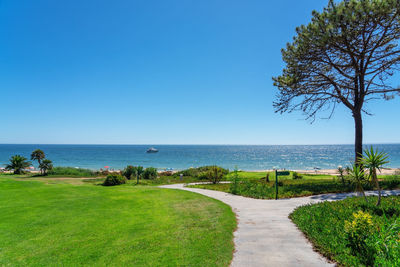 Scenic view of sea against clear blue sky