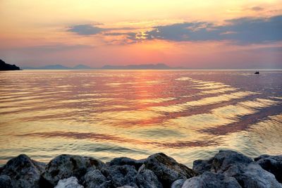 Scenic view of sea at sunset