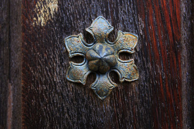 Close-up of metallic pattern on wood