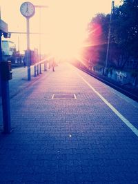 Empty road at sunset