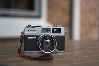 Close-up of camera on table