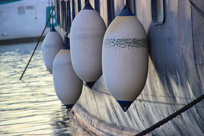 Close-up of clothes buoys on wood