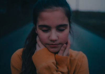 Close-up portrait of young woman