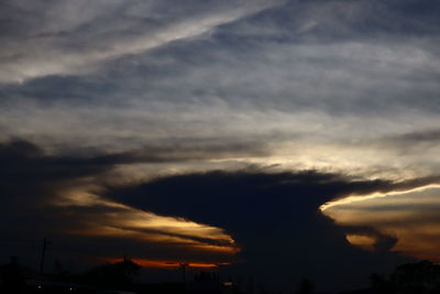 Low angle view of dramatic sky during sunset