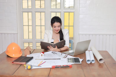 Woman working on table