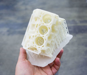 Cropped hand holding ice cream