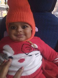 Portrait of cute girl wearing hat during winter