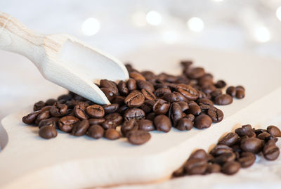 Close-up of coffee beans on table