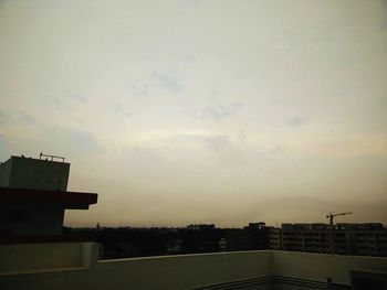 Cityscape against sky during sunset