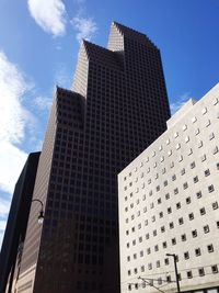 Low angle view of modern building against sky