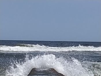 Scenic view of sea against clear sky