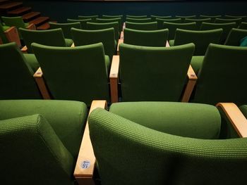 High angle view of empty chairs in auditorium