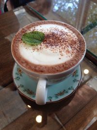 Close-up of cappuccino on table