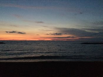 Scenic view of sea against dramatic sky