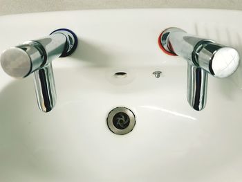 High angle view of faucet in bathroom