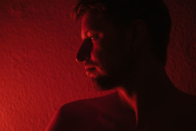 Close-up of young man looking away