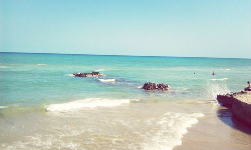 Scenic view of sea against clear sky