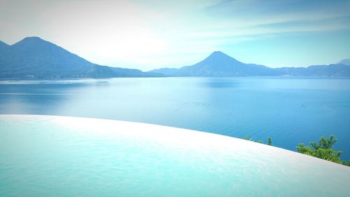 Scenic view of lake against blue sky