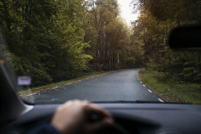 Road seen through car windshield