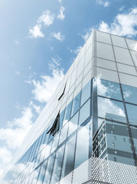 Low angle view of modern building against sky