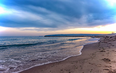 Scenic view of sea against sky during sunset