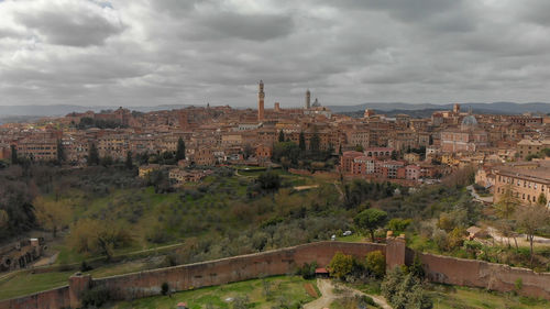 High angle view of townscape against sky in city