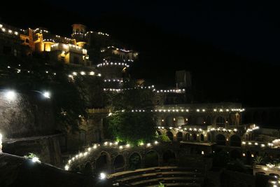 High angle view of illuminated buildings at night