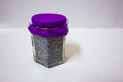 High angle view of ice on table against white background