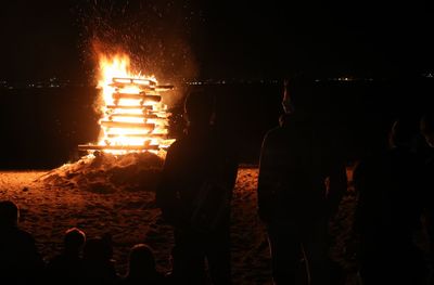 Group of people in the dark