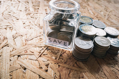 High angle view of coins on table