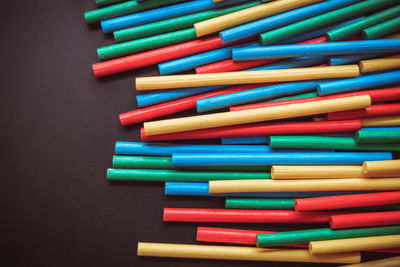 Close-up of multi colored pencils on table