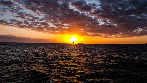 Scenic view of sea against sky during sunset
