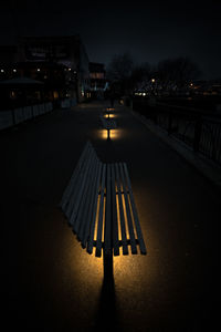 Illuminated light against sky at night