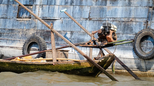 Wooden riverboat on the mekon river. diesel engine.