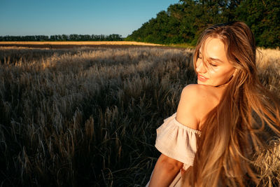 Connect with nature, slow down, be present, get into your senses. peaceful alone young woman in