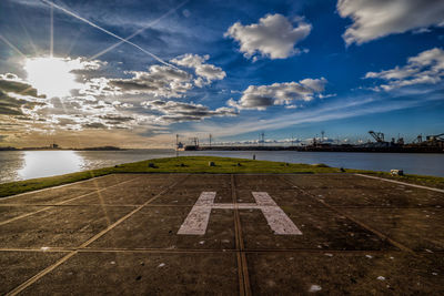 View of helicopter landing by water