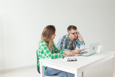 Men sitting on table