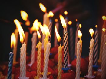 Close-up of burning candles