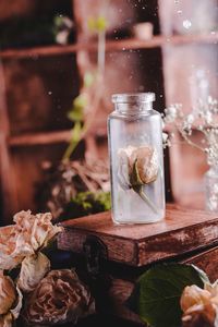 Close-up of glass jar on table