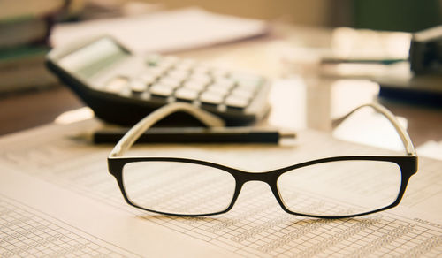 Close-up of eyeglasses on table