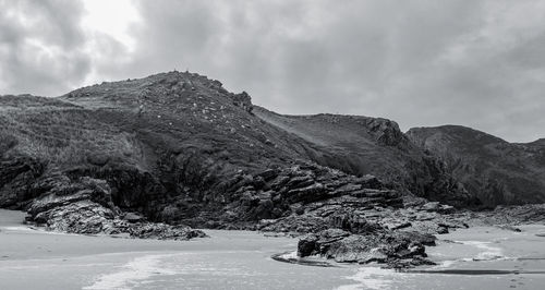 Scenic view of mountains against sky during winter