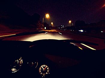 Cars on road at night