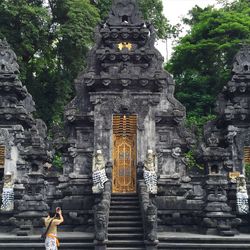 Tourists in front of building