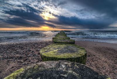 Scenic view of sea against sky during sunset