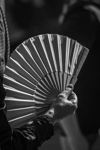 Close-up of hand holding umbrella