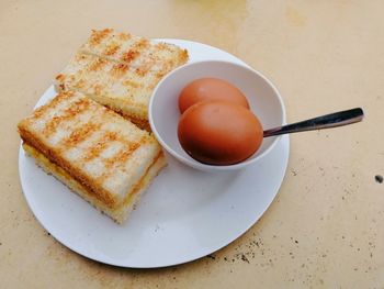 High angle view of breakfast served on table