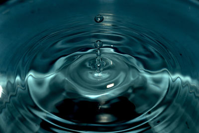 Close-up of drop splashing in water