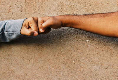 Close-up of hand holding hands